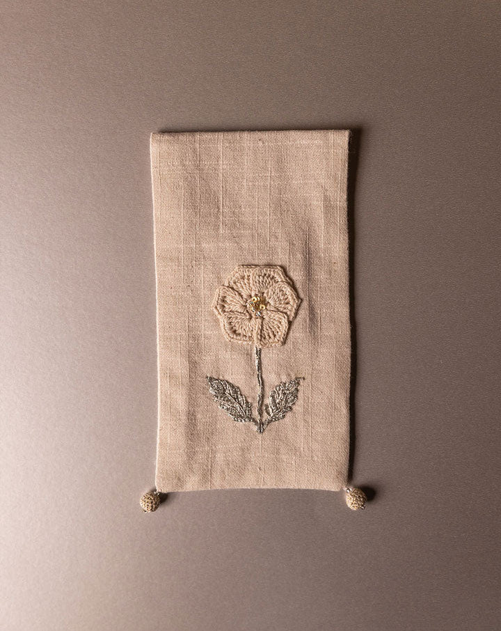 Elegant handcrafted crochet pouch, eco-friendly design by The Mango House Trust
