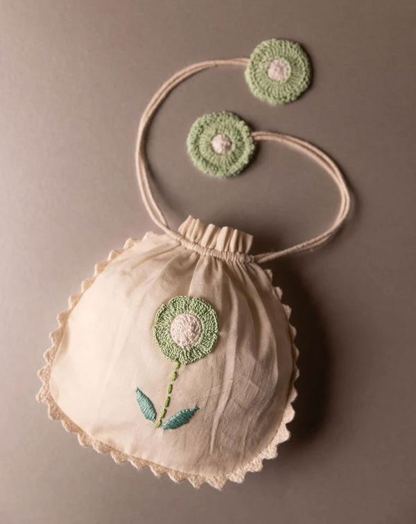 Eco-friendly crochet pouch, handmade sustainable accessory by The Mango House Trust