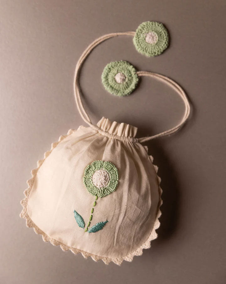 Eco-friendly crochet pouch, handmade sustainable accessory by The Mango House Trust